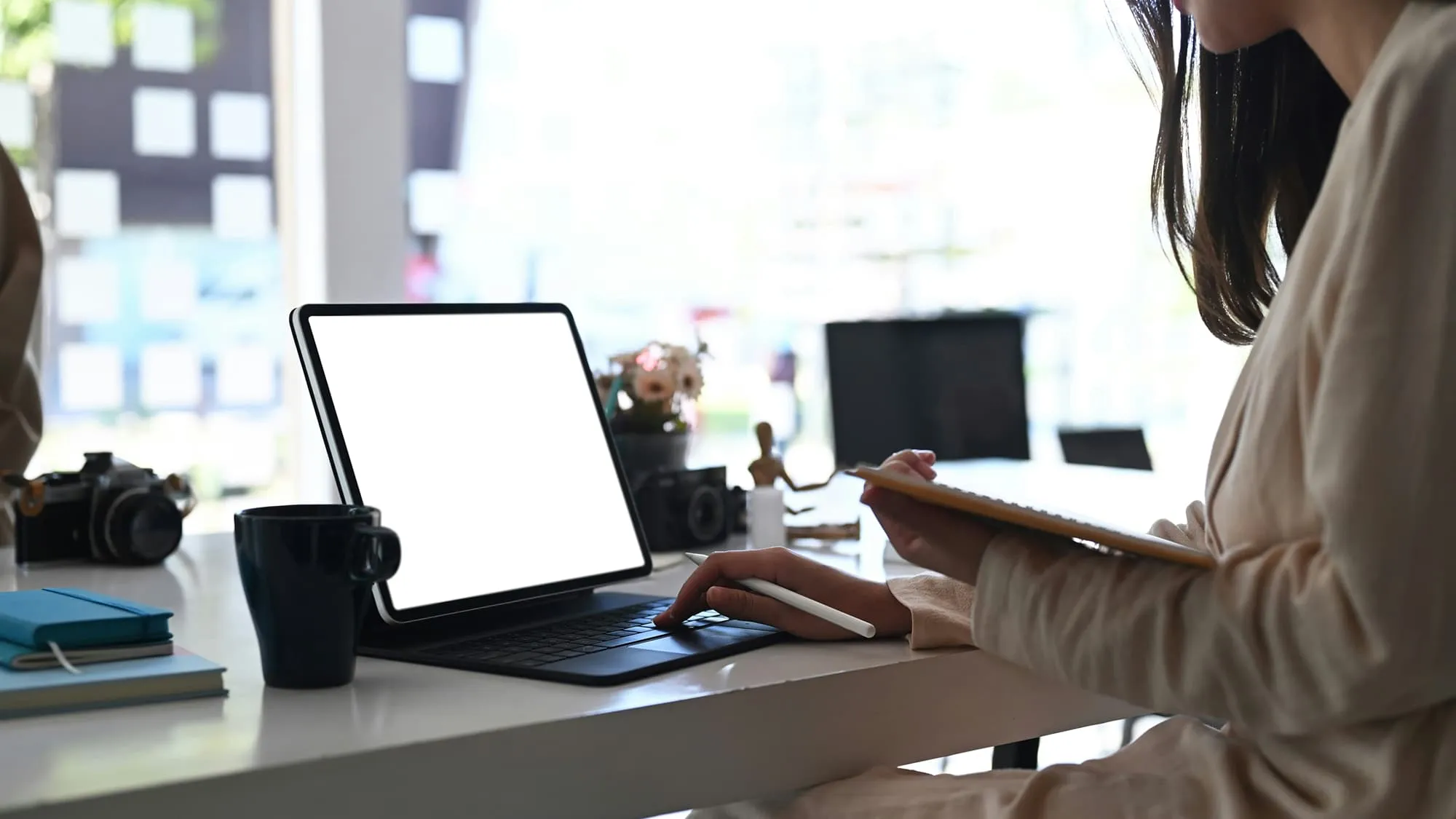 IT professional working on a laptop at a desk